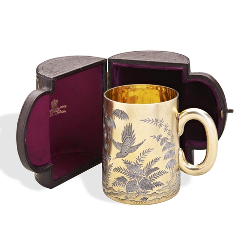 63 - A CASED SILVER GILT AESTHETIC MOVEMENT MUG, LONDON 1886. A silver gilt mug in a fitted Morocco case ... 