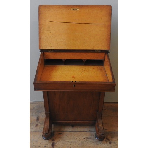 50 - A LATE VICTORIAN WALNUT DAVENPORT, CIRCA 1875, the hinged cover inset with gilt tooled leather panel... 