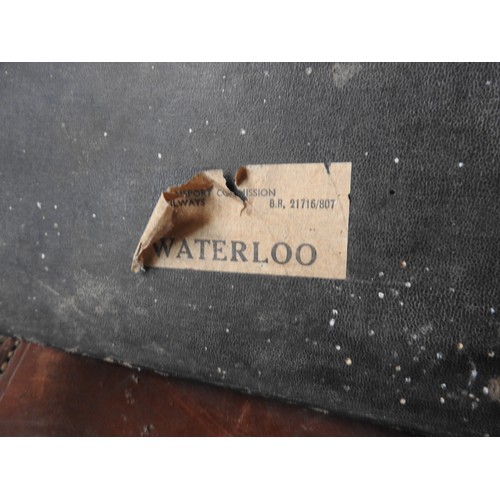 446 - A VINTAGE LEATHER TRAVEL TRUNK AND AN AUTOMOBILE TRUNK, the pig skin case with vintage labels attach... 