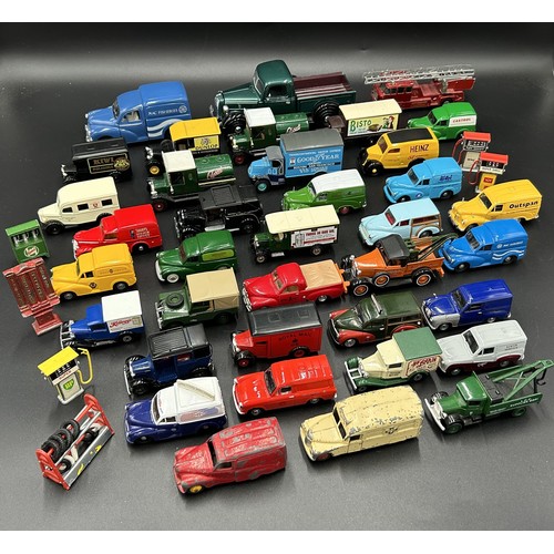 518 - A SELECTION OF COMMERCIAL MODEL TOY VANS AND TRUCKSBy Matchbox, Corgi, Dinky, covering a wide range ... 