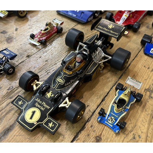 523 - COLLECTION OF CLASSIC GRAND PRIX MODELSIncludes larger scale models of 1970s Ferrari, Alfa-Romeo, an... 