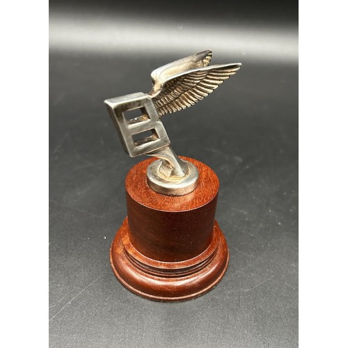 490 - A SMALL SILVER BENTLEY 'FLYING B' MASCOT1950s, silver. A presentation for long service to a former m... 