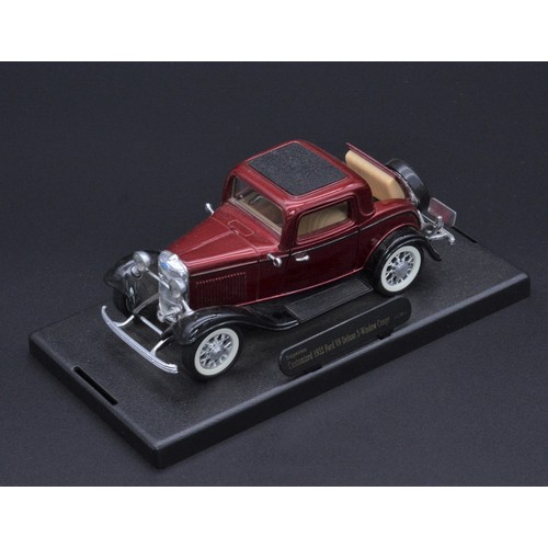 514 - 1:24 1931 FORD MODEL A PICKUP BY DANBURY MINTAlso included:1:24 1933 FORD DELUXE COUPE BY DANBURY MI... 