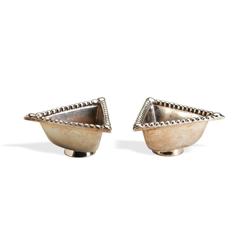 68 - A PAIR OF TRAPRAIN HOARD SALT CELLARS, BROOK & SON, EDINBURGH 1932. A pair of triangular salt ce... 