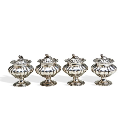 102 - A SET OF FOUR COMPRESSED MELON SHAPE CONDIMENT SHAKERS, CALCUTTA C.1840.A set of four condiment shak... 