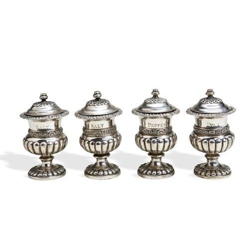 103 - SET OF FOUR HALF FLUTED CONDIMENT SHAKERS, CALCUTTA C.1840. A set of four condiment shakers, two eng... 