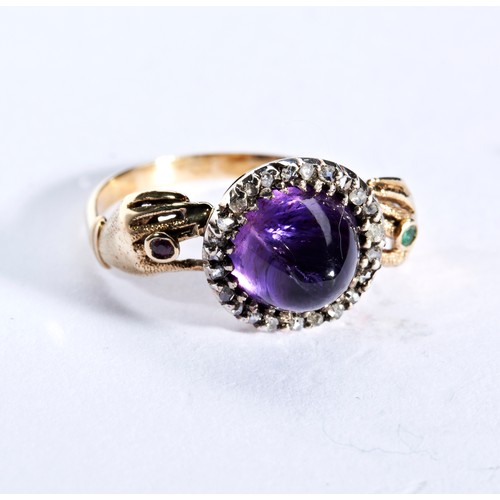 202 - AN ANTIQUE AMETHYST AND DIAMOND FEDE RING  the round sugar loaf amethyst surrounded by rose cut, cla... 