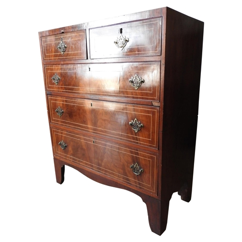 75 - A REGENCY MAHOGANY CHEST OF DRAWERS, two short drawers over three long drawers with string inlay, ra... 