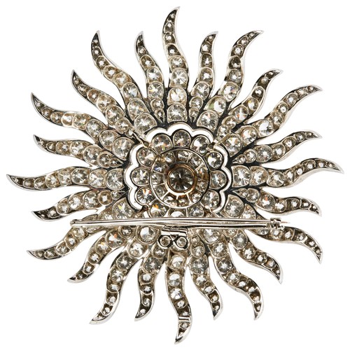 249 - A VICTORIAN DIAMOND SUN RAY BROOCH, CIRCA 1890the principal old brilliant-cut diamond cut down colle... 