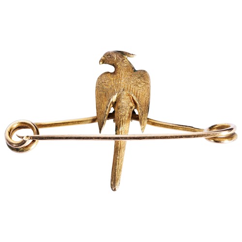 268 - A LATE VICTORIAN GOLD PIN, CIRCA 1890modelled as a Parrot with a red stone eye.Stamped '9ct'Total we... 