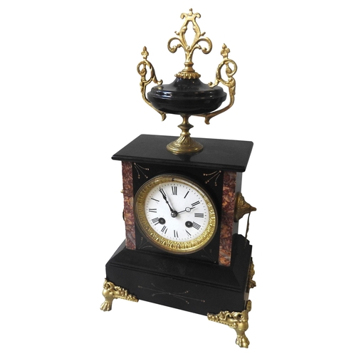 114 - A 19TH CENTURY SLATE BRACKET CLOCK, the rectangular form case housing a 9 cm enamelled dial, flanked... 