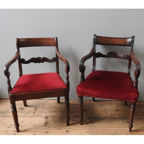 28 - A SET OF SIX REGENCY MAHOGANY DINING CHAIRS, WITH FLORAL AND LYRE CARVED CROSS BACK, DROP IN SEAT AN... 