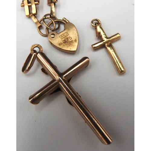 405 - A GOLD GATE BRACELET AND TWO CRUCIFIX PENDANTS, the gate bracelet and larger pendant both marked .37... 