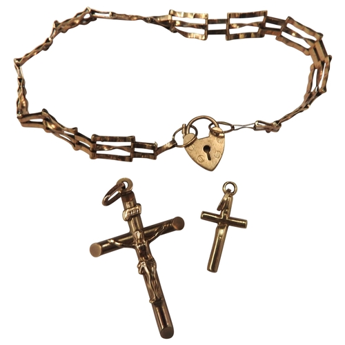 405 - A GOLD GATE BRACELET AND TWO CRUCIFIX PENDANTS, the gate bracelet and larger pendant both marked .37... 