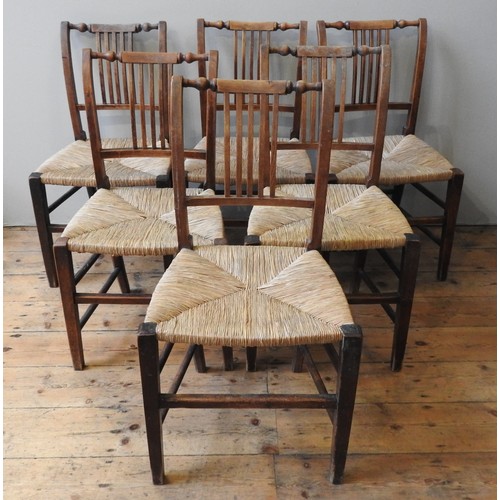 22 - A SET OF SIX 19TH CENTURY COUNTRY CHAIRS, baluster turned top rail above a slatted back panel, with ... 
