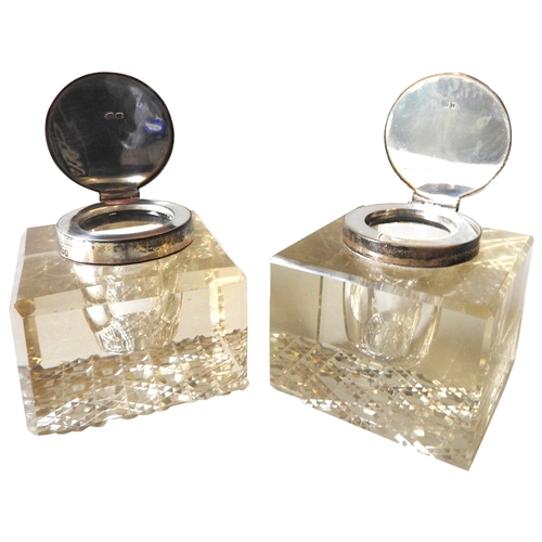 419 - A PAIR OF VINTAGE SILVER MOUNTED CUT GLASS INKWELLS, square form with bevelled edges and hobnail pat... 