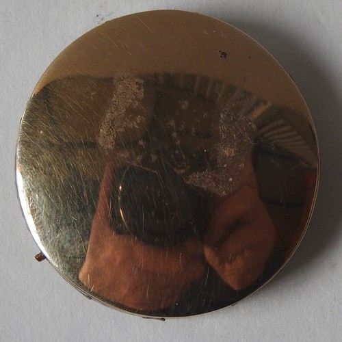 436 - AN EARLY 20TH CENTURY PORTRAIT MINIATURE OF CHILD, hand painted on a circular panel in a yellow meta... 