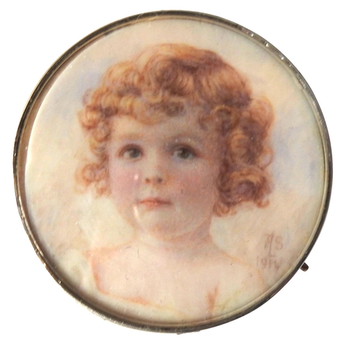 436 - AN EARLY 20TH CENTURY PORTRAIT MINIATURE OF CHILD, hand painted on a circular panel in a yellow meta... 