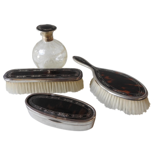 420 - A VINTAGE SILVER AND TORTOISESHELL BOX, MATCHING SCENT BOTTLE AND TWO MATCHING BRUSHES, the oval for... 