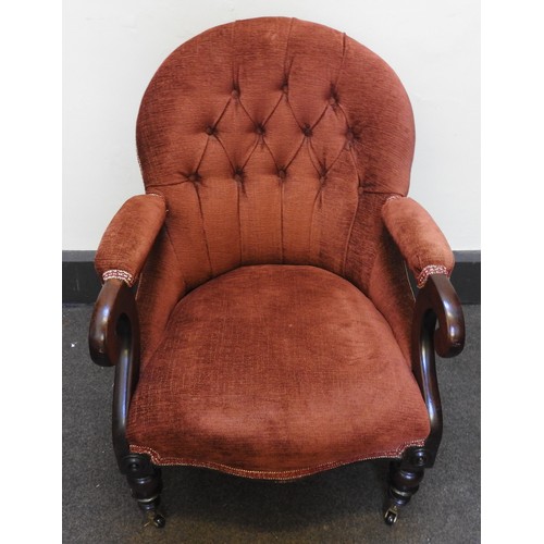 60 - A LATE VICTORIAN MAHOGANY NURSING CHAIR, CIRCA 1870, with button upholstered arch back above an over... 