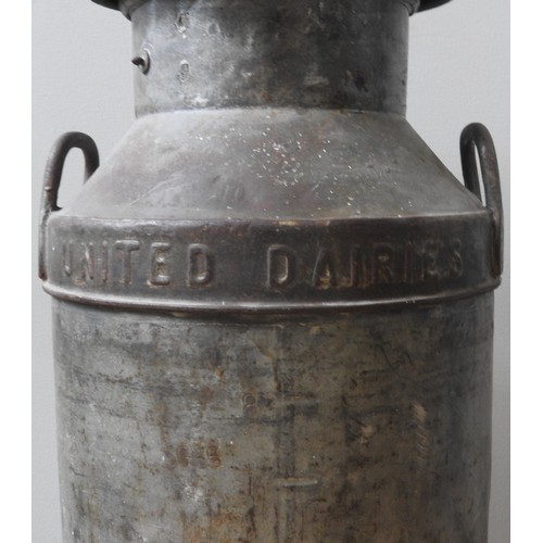 443 - A COLLECTOR'S VINTAGE UNITED DAIRIES MILK CHURN