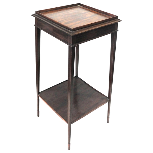 41 - A LATE VICTORIAN MAHOGANY URN STAND, galleried square top with line inlay raise on four slender tape... 