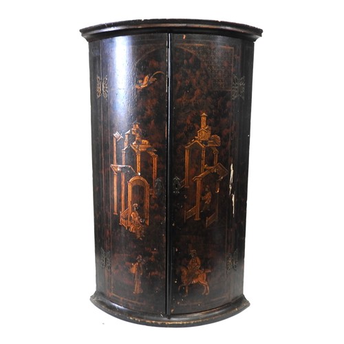 57 - A LATE 18TH/EARLY 19TH CENTURY CHINOISERIE DECORATED CORNER CUPBOARD, the bow front doors painted an... 