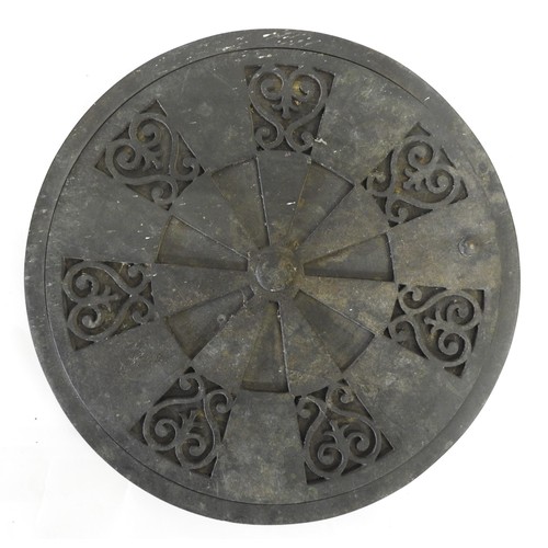 106 - A VICTORIAN CAST-IRON ADJUSTABLE FLOOR VENT, CIRCA 1850, circular form with rotating cover, inset wi... 