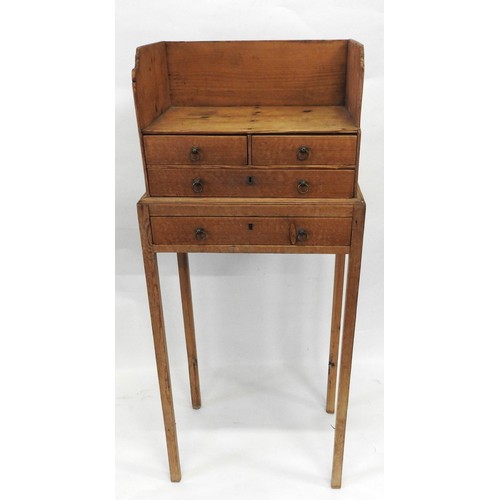 7 - A 19TH CENTURY WAXED PINE CLERK'S STAND, three quarter galleried rectangular top above two short and... 