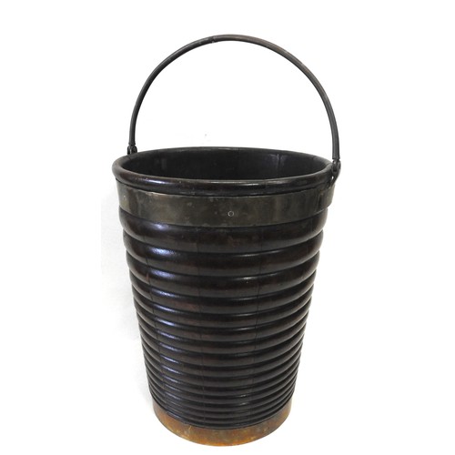 452 - AN IRISH REGENCY MAHOGANY PEAT BUCKET, CIRCA 1820, of ribbed, coopered form with brass banding and r... 