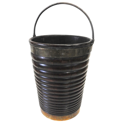 452 - AN IRISH REGENCY MAHOGANY PEAT BUCKET, CIRCA 1820, of ribbed, coopered form with brass banding and r... 