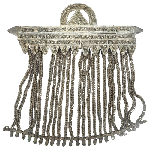 403 - A VINTAGE BEDOUIN PENDANT, possibly Yemeni or Omani silver, comprised of a beaded bar suspended from... 