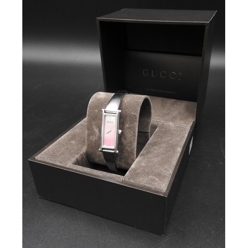 401 - GUCCI STAINLESS STEEL WATCH, with inscribed pink oblong dial, in presentation box