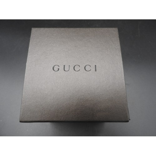 401 - GUCCI STAINLESS STEEL WATCH, with inscribed pink oblong dial, in presentation box