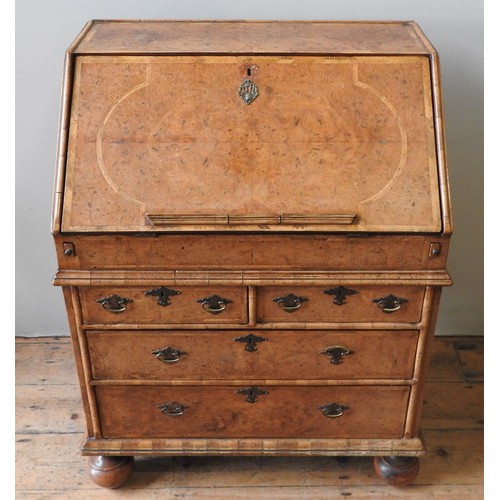 96 - A WALNUT BUREAU, LATE 19TH / EARLY 20TH CENTURY, in the Queen Anne style, feather banded top and fro... 