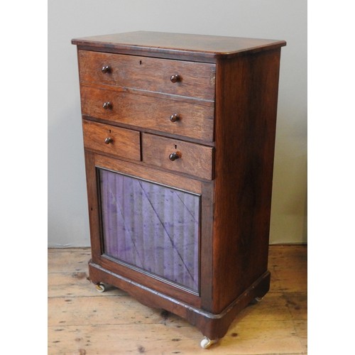 66 - A LATE VICTORIAN WALNUT CABINET, with a pull out drop front secretaire section above two frieze draw... 