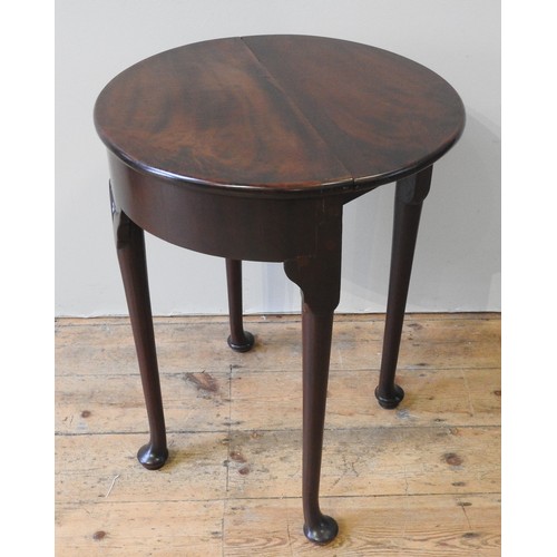 64 - A 19TH CENTURY MAHOGANY DROP-LEAF DEMI-LUNE TABLE, of compact proportions, raised on three Queen Ann... 