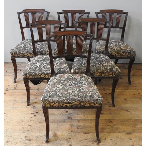 2 - A SET OF SIX 19TH CENTURY MAHOGANY DINING CHAIRS, curved top rail over three fluted splats, the wide... 