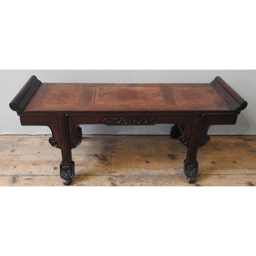 86 - A FINE CHINESE HARDWOOD KANG TABLE, of compact proportions, scroll ended panelled rectangular top ab... 