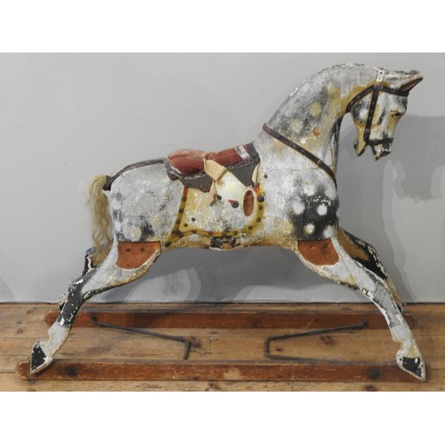 444 - A VINTAGE HAND PAINTED CHILD'S ROCKING HORSE, CIRCA 1920, cream and black dapple finish, in need of ... 