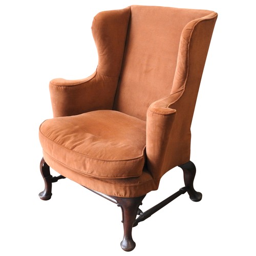 95 - A 19TH CENTURY MAHOGANY FRAMED WING CHAIR, in the Queen Anne style, with elegant scrolling arm suppo... 