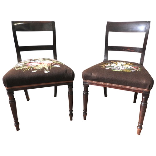 46 - A SET OF SIX GEORGE III MAHOGANY DINING CHAIRS, curved top rail and splat above floral needlepoint s... 
