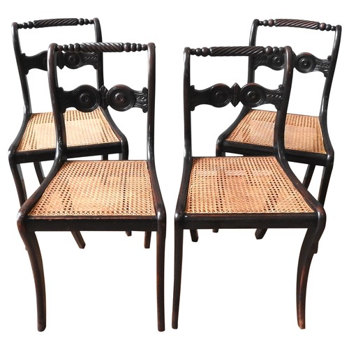 80 - A SET OF FOUR 19TH CENTURY CANE SEAT MAHOGANHY CHAIRS, rope twist top rails above roundel carved spl... 