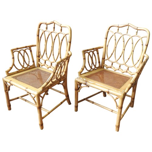 91 - A PAIR OF GEORGE III FAUX BAMBOO CHAIRS, CIRCA 1800, each with open lattice backs and arm supports.,... 