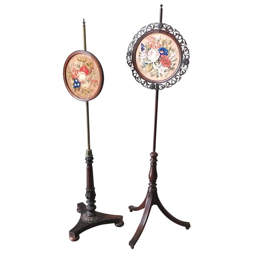 69 - TWO 19TH CENTURY POLE SCREENS, one rosewood and brass example, raised on a platform base, the other ... 