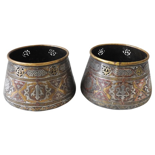 449 - A PAIR OF SILVER INLAID CAIROWARE JARDINIERES, 19TH CENTURY, the tapered sides profusely decorated w... 