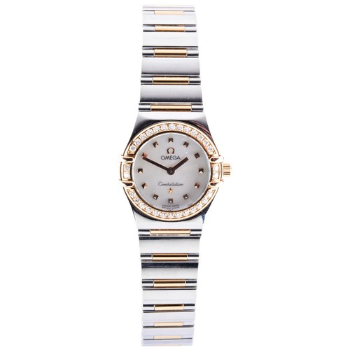 376 - OMEGA: A STAINLESS STEEL AND GOLD DIAMOND SET LADIES QUARTZ CONSTELLATION 