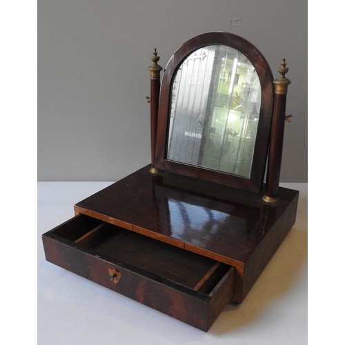 251 - A FRENCH EARLY 19TH CENTURY TOILET MIRROR, the arch plate supported by twin Doric pillar supports su... 