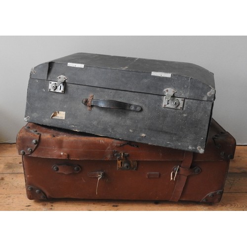 500 - A VINTAGE LEATHER TRAVEL TRUNK AND AN AUTOMOBILE TRUNK, the pig skin case with vintage labels attach... 