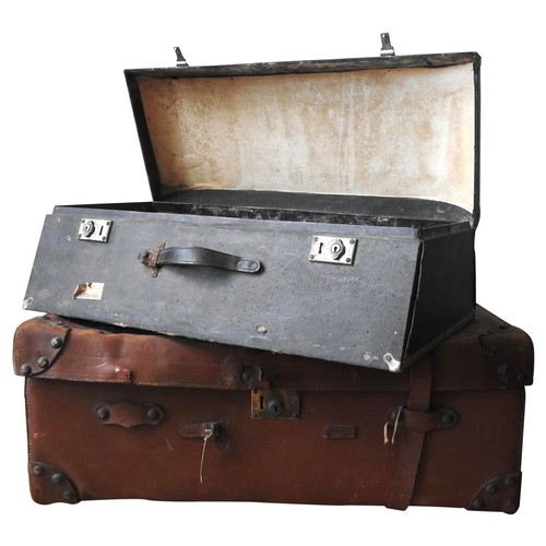 500 - A VINTAGE LEATHER TRAVEL TRUNK AND AN AUTOMOBILE TRUNK, the pig skin case with vintage labels attach... 